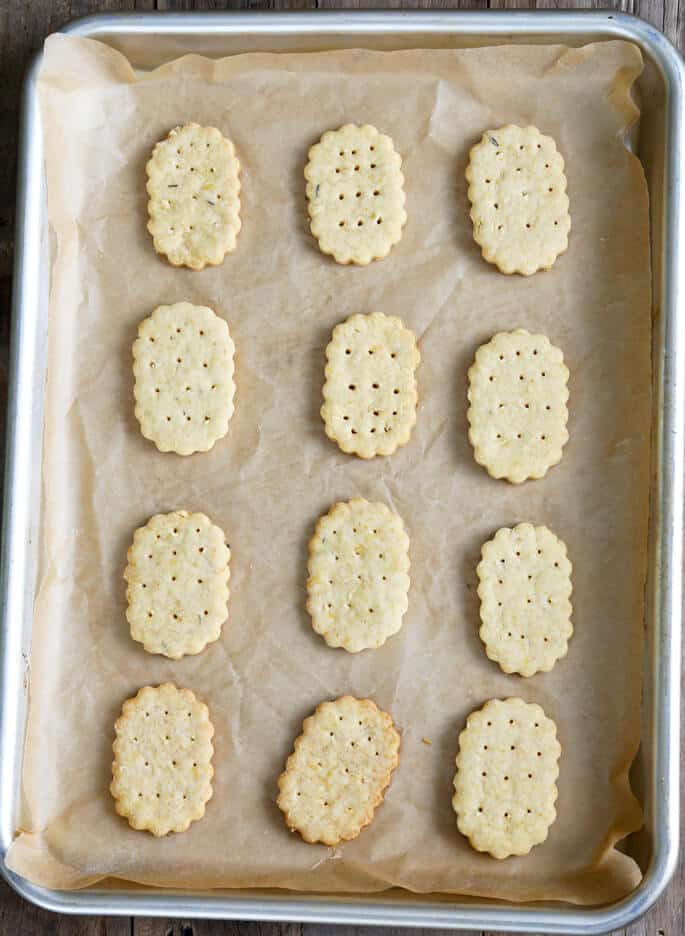 Overhead view of crackers on beige paper