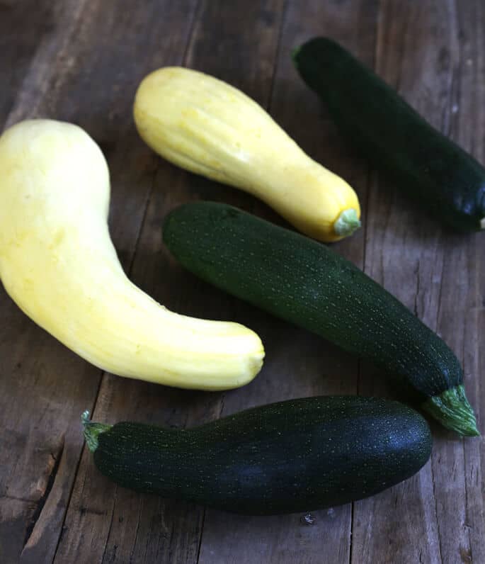 Zucchini and squash on a wooden surface 