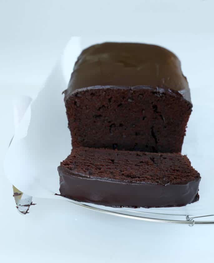 Chocolate pound cake on a white surface