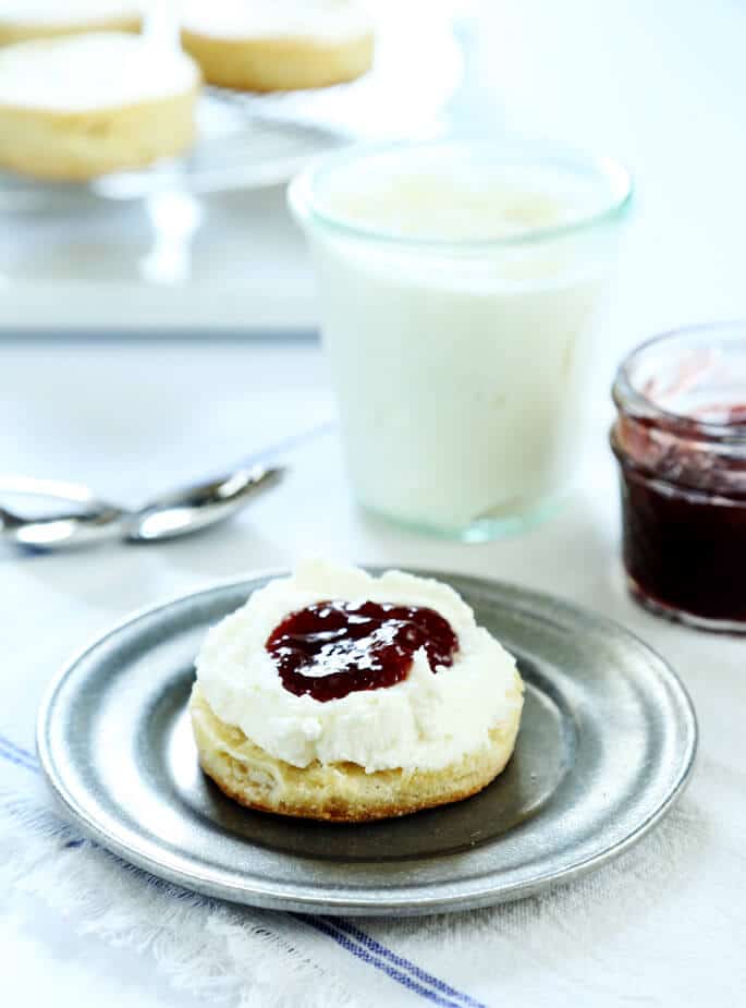 Ricotta biscuit with toppings on a gray plate