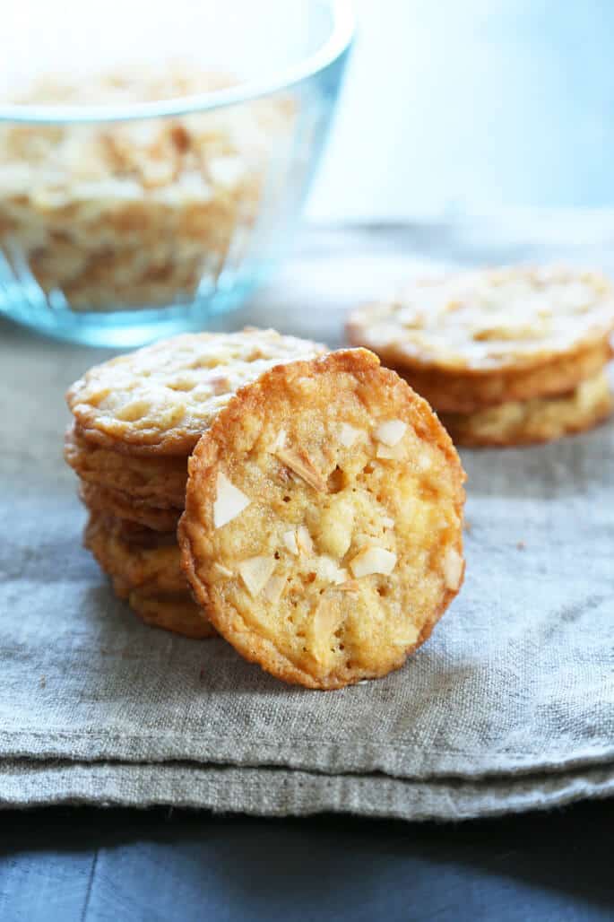 The gluten free coconut cookies are super simple thin and crispy drop cookies, and as addictive as potato chips. You can't stop at just one!