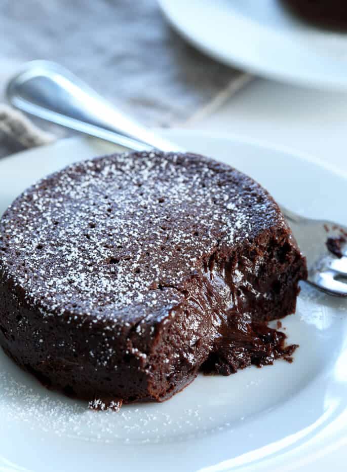 Restaurant-style gluten free chocolate lava cakes with a warm, gooey center. For your Valentine, or any time!