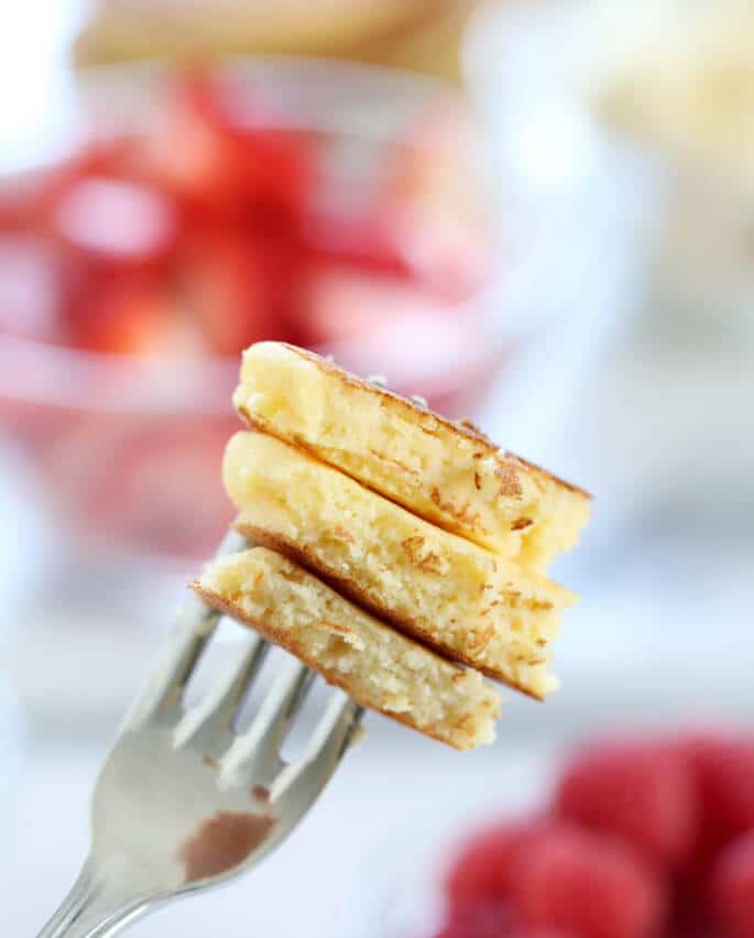 A fork with three pieces of coconut flour pancakes