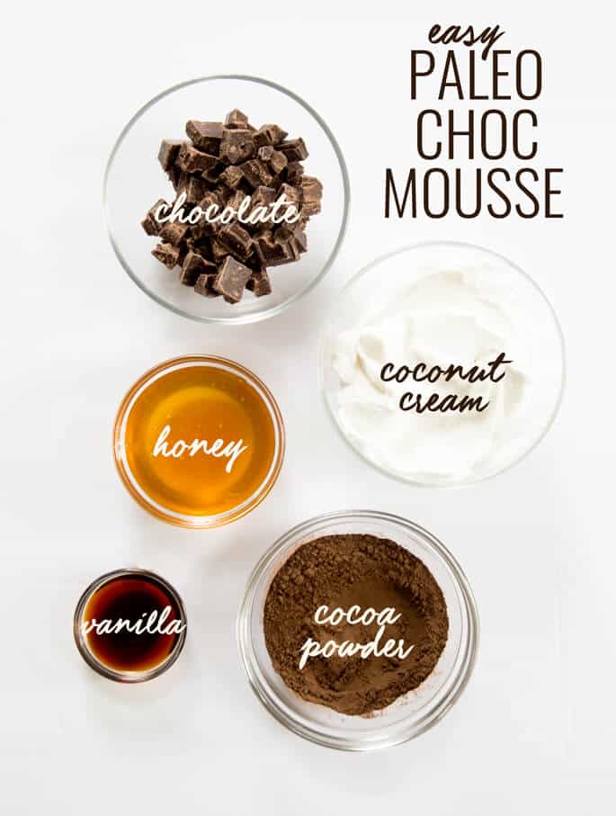 Smooth and creamy Paleo chocolate mousse, made with chocolate, coconut cream, cocoa powder, honey and vanilla. Just blend it and let it set. So rich delicious! http://glutenfreeonashoestring.com/