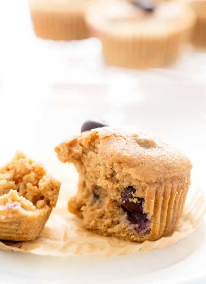 A close up of a healthy blueberry muffin broken in half