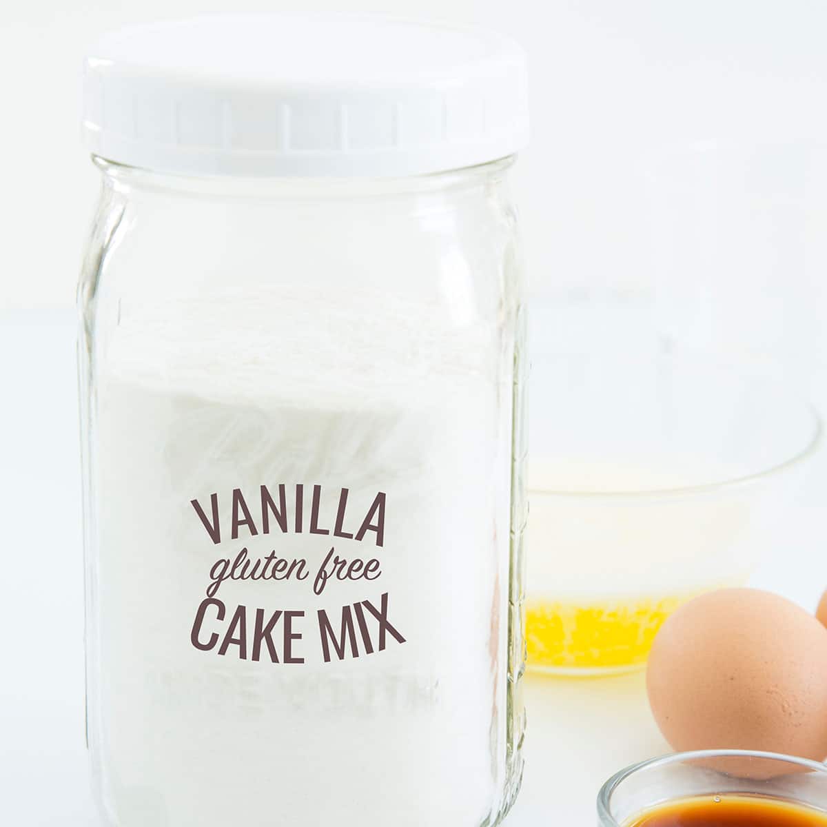 gluten free cake mix for vanilla cake in jar with label with egg and vanilla