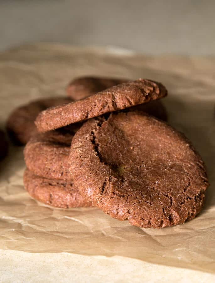 A close up of Nutella cookies on beige paper 