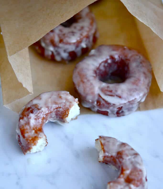 Old-fashioned donuts like these gluten free yeast-raised doughnuts are meant to be fried, not baked. They’re a shadow of their best selves when baked. Just be sure your oil is hot enough, and the doughnuts won’t absorb much oil at all.