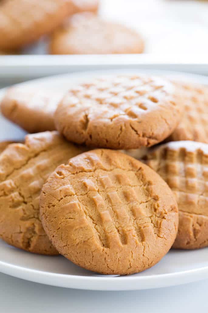 Close up of peanut butter cookies on a white plate