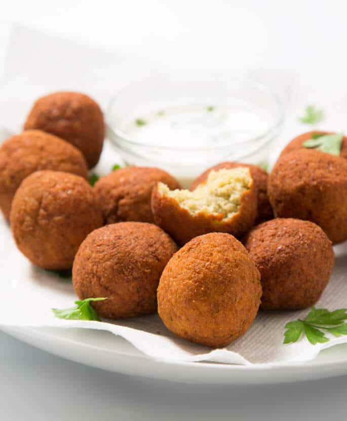 Authentic gluten free falafel, made with soaked raw chickpeas and just the right herbs and spices. The ultimate Middle Eastern street food, made gluten free!