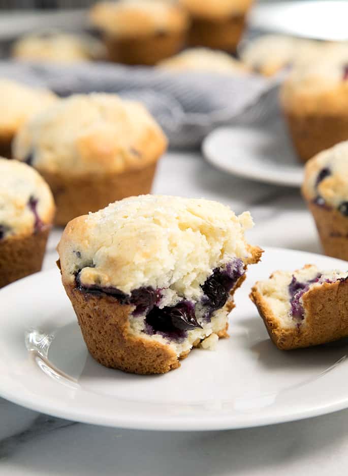 These classic gluten free blueberry muffins are crisp on the outside, soft and tender inside. So easy to make, and they taste just like they came from your favorite bakery!