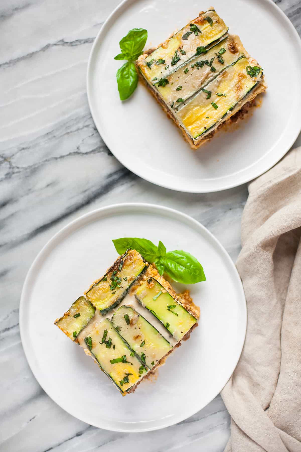 Craving Italian comfort food but avoiding grains and cheese? This Paleo zucchini lasagna is for you. 