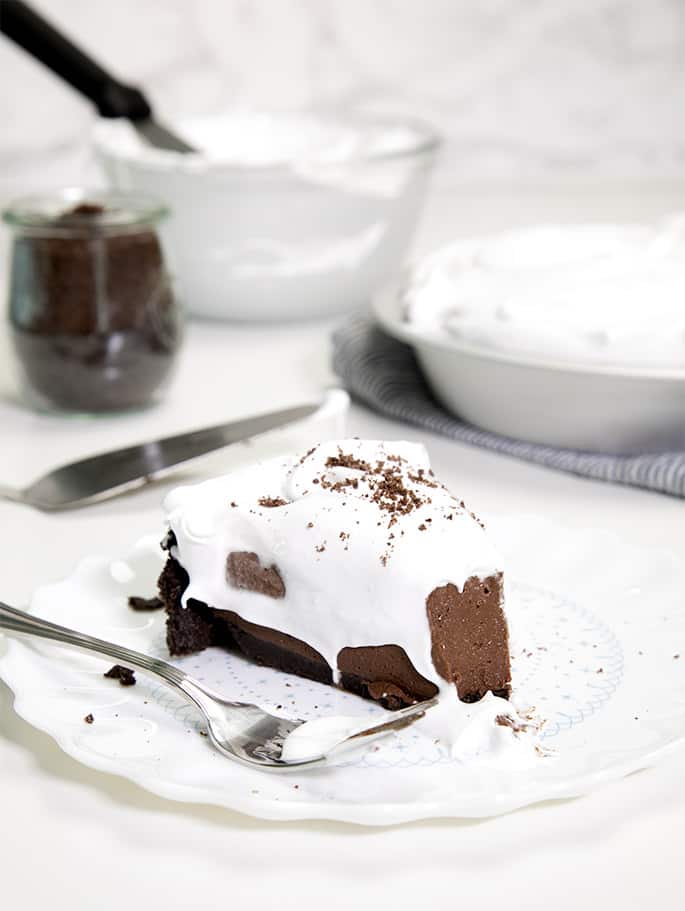 This chocolate pudding pie is my favorite no bake gluten free treat of the season. The filling is smooth as silk, plus the cookie crust slices clean, and adds just the right amount of cookie crunch.