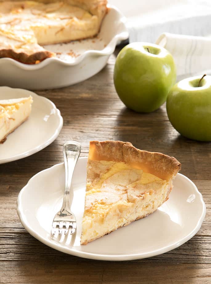 This traditional, lightly sweet egg custard pie with apples is made perfect for apple season with layers of thinly sliced apples. With or without a crust!