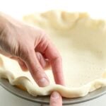 This extra flaky gluten free pie crust is made with sour cream and rolls out beautifully. You can have the perfect recipe for pie crust in your baking toolbox.