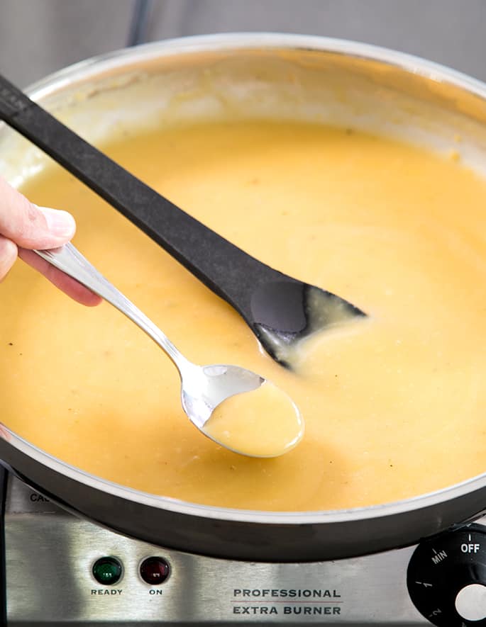 This condensed chicken and vegetable soup is packed with flavor and can be made up to a week ahead of time. Just add more stock and dinner is served!