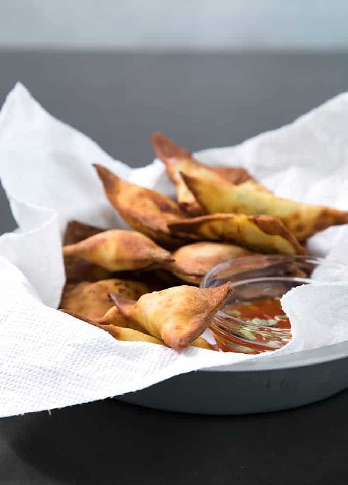 These Air Fryer fried wontons are made with very little oil but are still super crispy and crunchy. They'll be the first thing to go at a party!