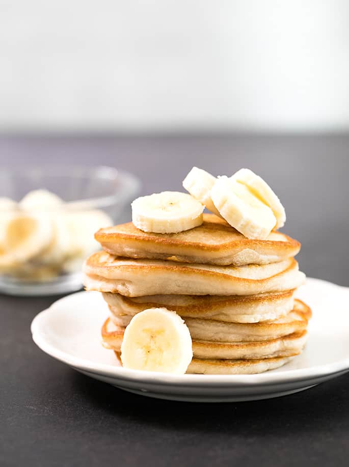 This gluten free vegan pancakes recipe makes super fluffy eggless pancakes in one bowl, in just minutes. Even if you're a vegan, you can still enjoy pancakes!