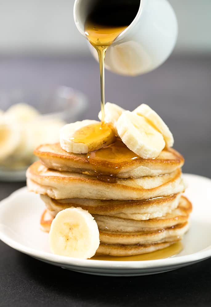 This gluten free vegan pancakes recipe makes super fluffy eggless pancakes in one bowl, in just minutes. Even if you're a vegan, you can still enjoy pancakes!