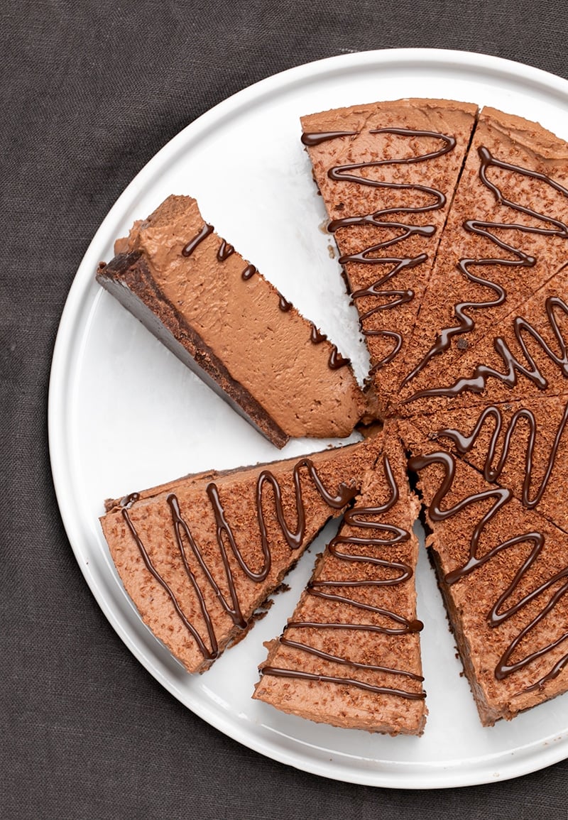 Overheaad image of light brown triangles with squiggle of dark brown on top on white serving plate