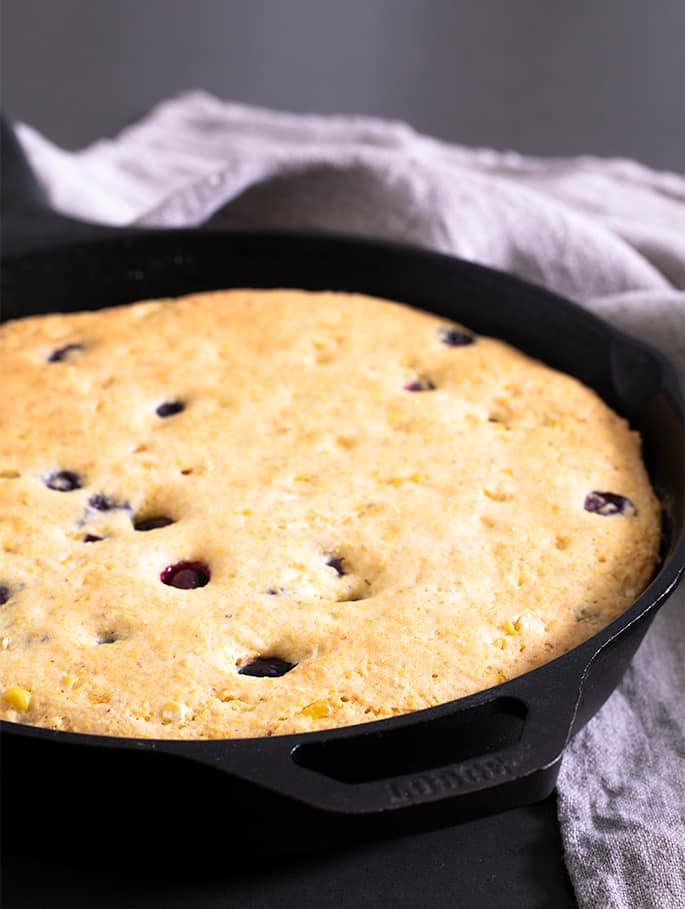 This recipe for gluten free blueberry cornbread is a lightly sweet, naturally dairy-free take on a classic cornbread recipe. It's perfect for potlucks and barbecues, or even for breakfast!