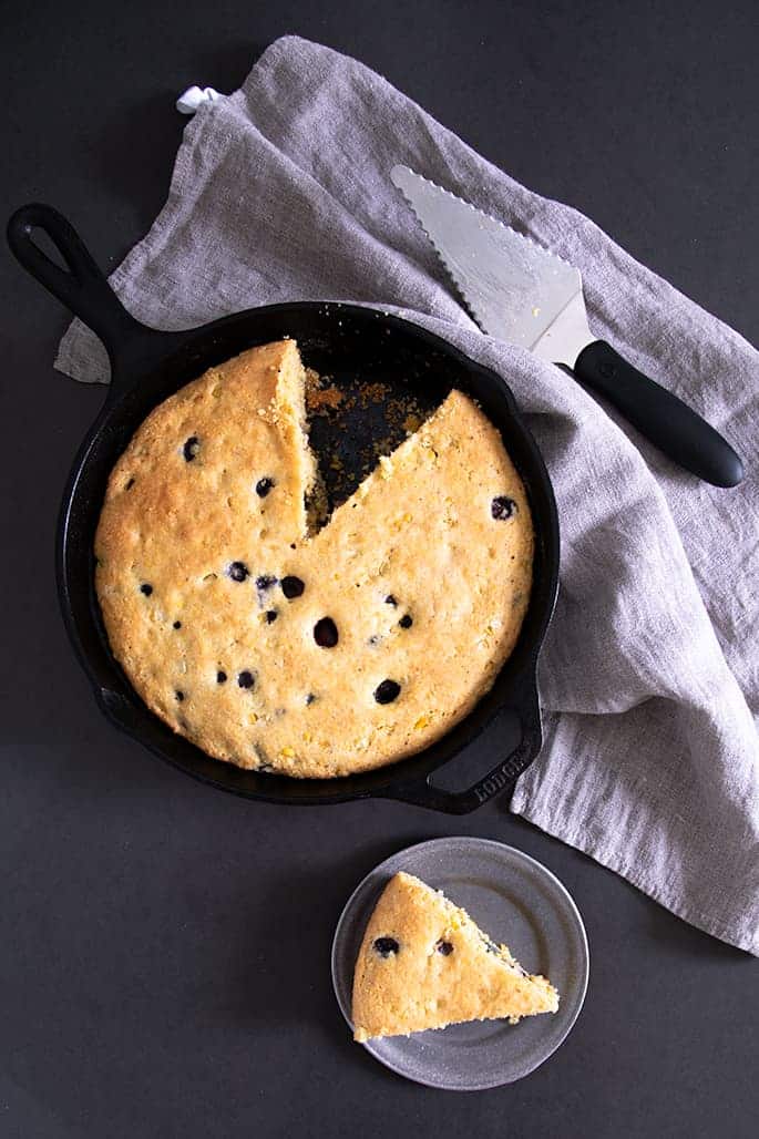 This recipe for gluten free blueberry cornbread is a lightly sweet, naturally dairy-free take on a classic cornbread recipe. It's perfect for potlucks and barbecues, or even for breakfast!