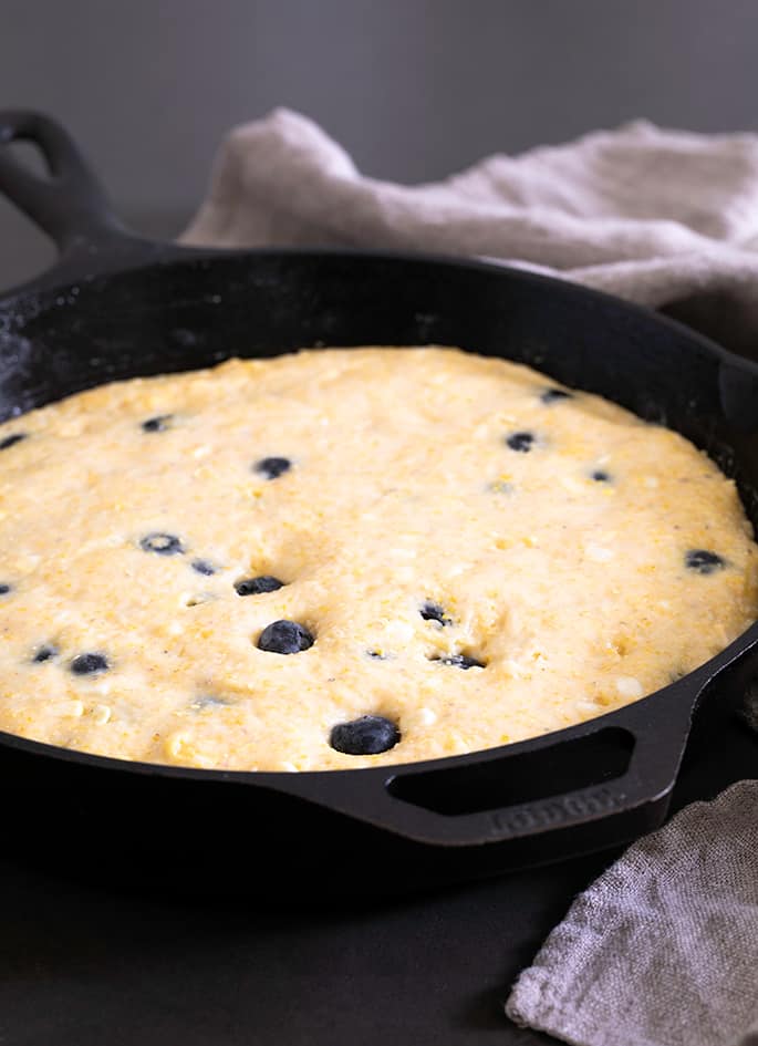 This recipe for gluten free blueberry cornbread is a lightly sweet, naturally dairy-free take on a classic cornbread recipe. It's perfect for potlucks and barbecues, or even for breakfast!