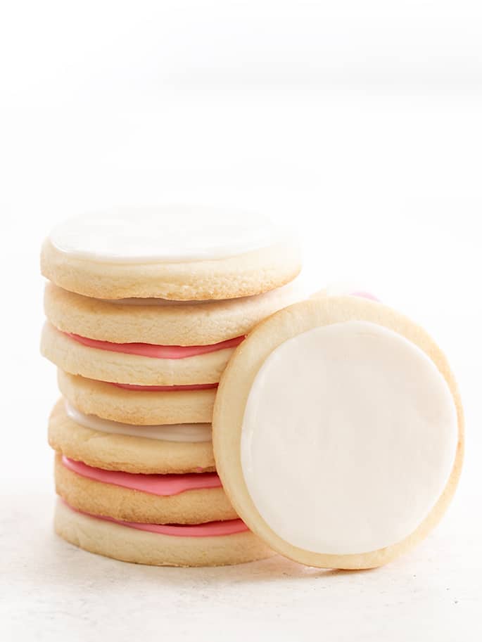 Meltaway cutout cookies in a stack with one on its side