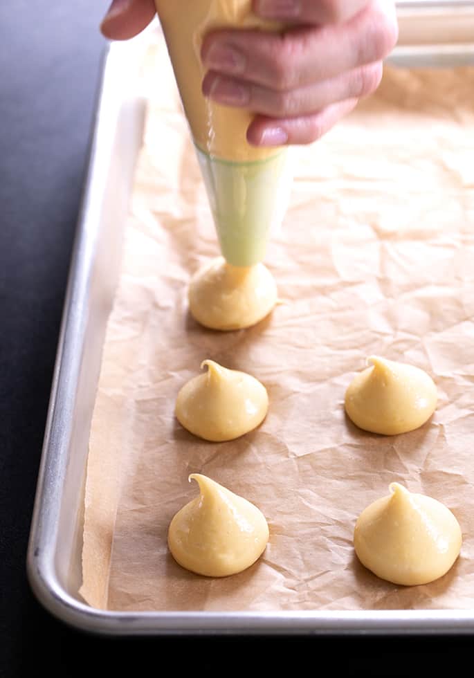 There are just 5 basic ingredients in these simple but fancy little cheese puffs with the funny French name, gougères. They'll never know they're gluten free unless you tell!