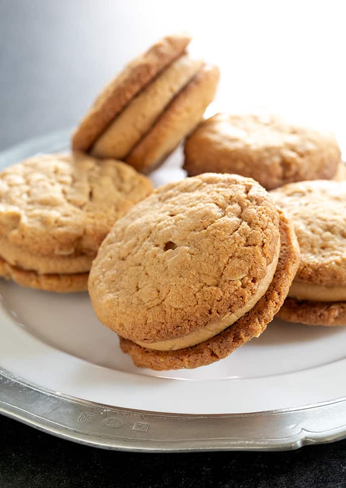 These crispy but tender peanut butter oatmeal cookies with a sweet, creamy peanut butter filling taste just like Do-Si-Dos Girl Scout Cookies—but they're gluten free. Some matters you just have to take into your own hands!