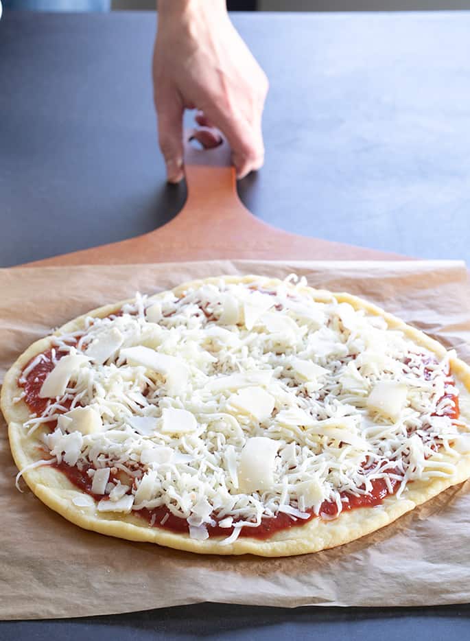 This keto pizza recipe is the perfect easy way to add some low carb eating to your life. It even has that perfect thin crust pizza "chew."