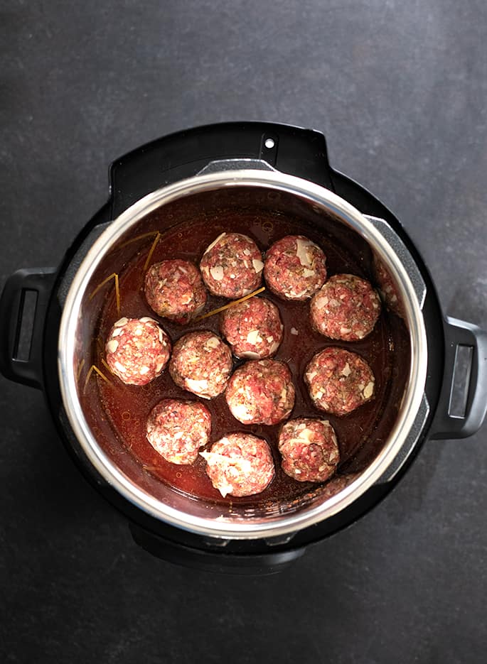 Once you learn to make these tender, flavorful gluten free meatballs and perfectly cooked gf spaghetti in the Instant Pot, you'll never want to make them any other way.