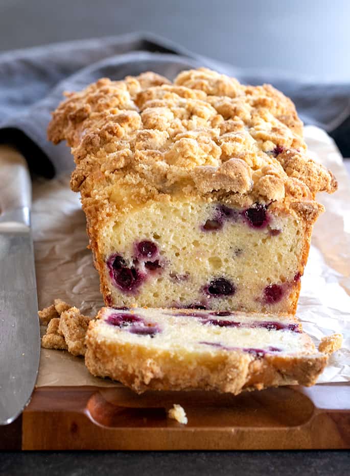 This gluten free blueberry muffin bread is a tender and rich quick bread made with sour cream, packed with fresh blueberries. Crumble topping (sort of) optional.