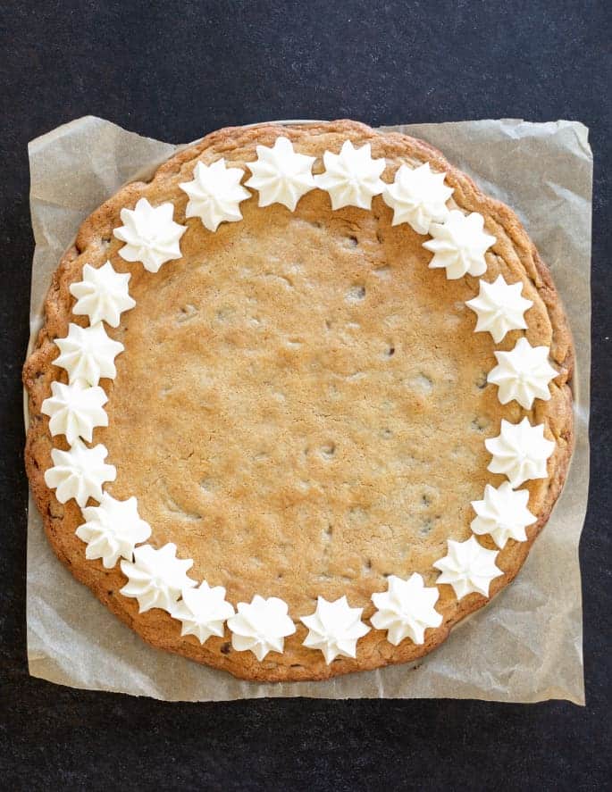 Let's make a big gluten free cookie cake, with chocolate chips, the blue and white frosting and everything. It's a celebration!