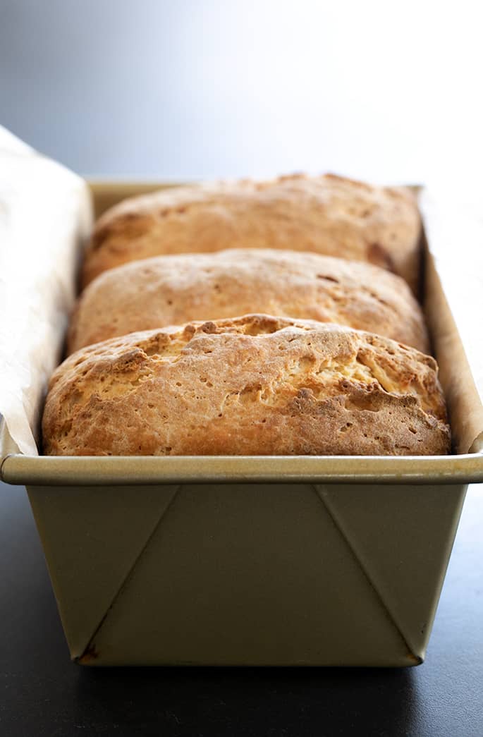 Closeup image of Japanese milk bread in a loaf pan