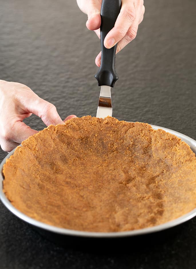 Learn how to make your own gluten free graham cracker crust and a whole world of easy pies of all sizes is within reach!