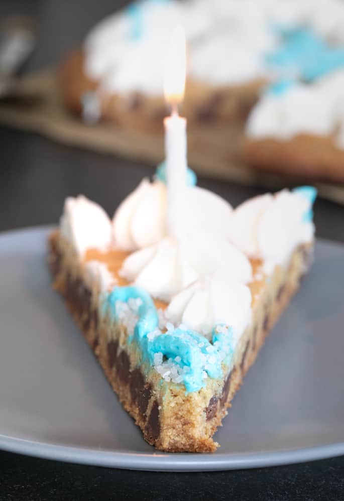 Let's make a big gluten free cookie cake, with chocolate chips, the blue and white frosting and everything. It's a celebration!