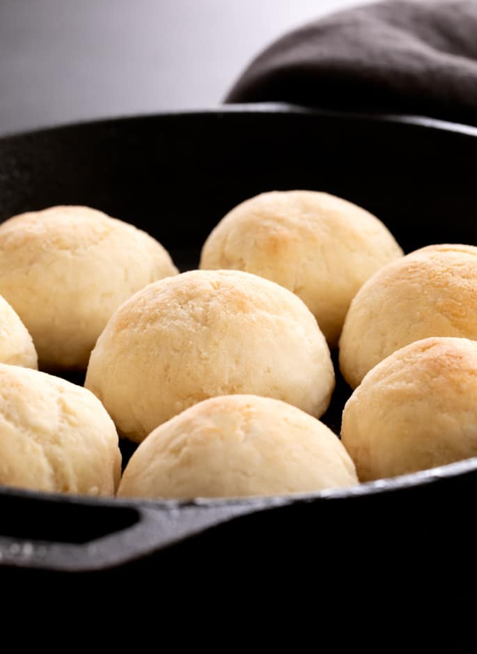 These super soft yeast free gluten free dinner rolls are ready for baking in the oven in 10 minutes. Never buy rolls again!