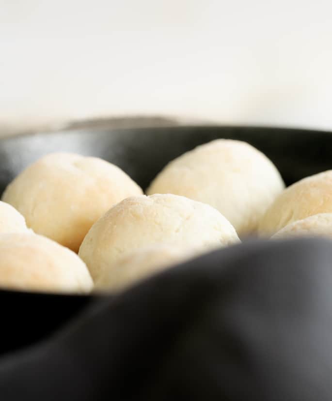 These super soft yeast free gluten free dinner rolls are ready for baking in the oven in 10 minutes. Never buy rolls again!