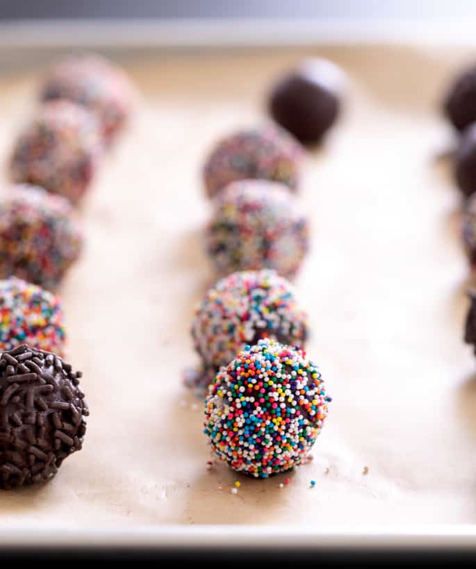 Fudge truffles with nonpareils and fudge truffles with chocolate sprinkles