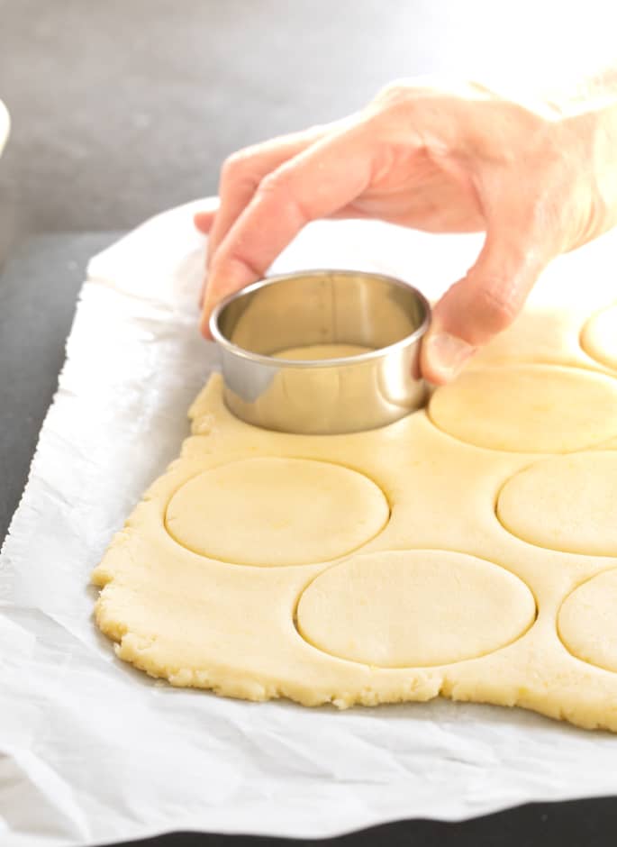 These soft, chewy cutout gluten free lemon sugar cookies are just like Lofthouse cookies, but with a simple lemon icing and just enough bright, citrus flavor.