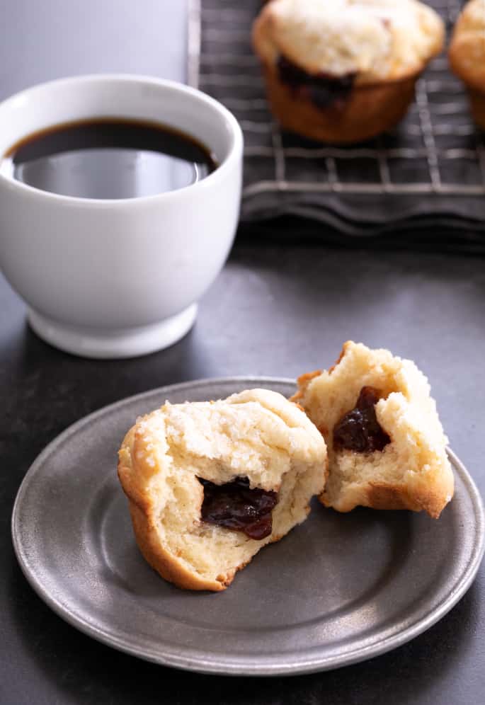 These extra tender gluten free donut muffins with jam filling taste like an old-fashioned cake donut, but they're baked easily in a muffin tin.