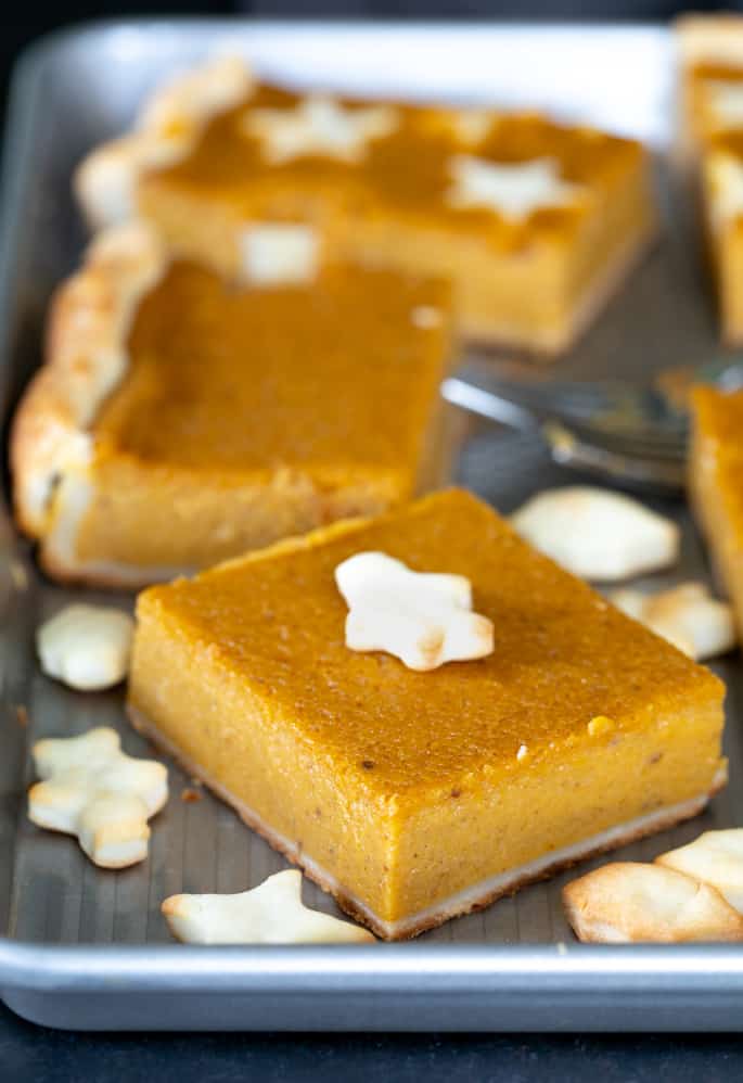 A piece of gluten free pumpkin slab pie closeup.