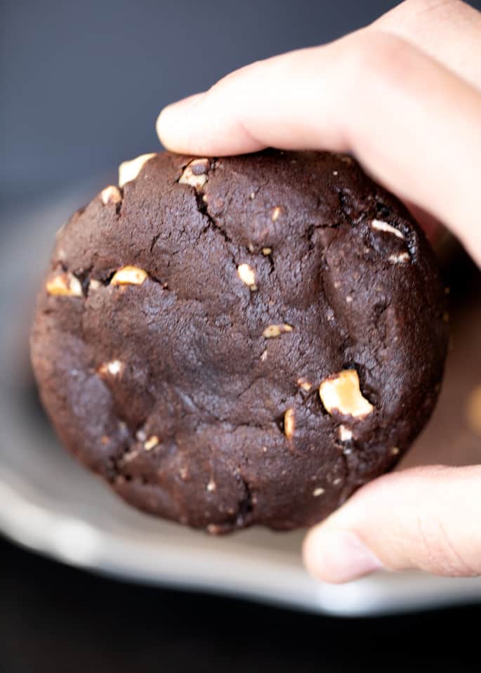 These super thick gluten free rocky road chocolate cookies are rich double chocolate chip cookies packed with nuts and marshmallows.