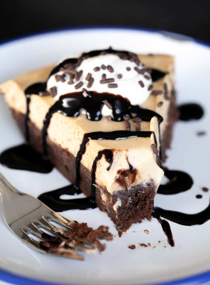 A closeup piece of brownie bottom pie.