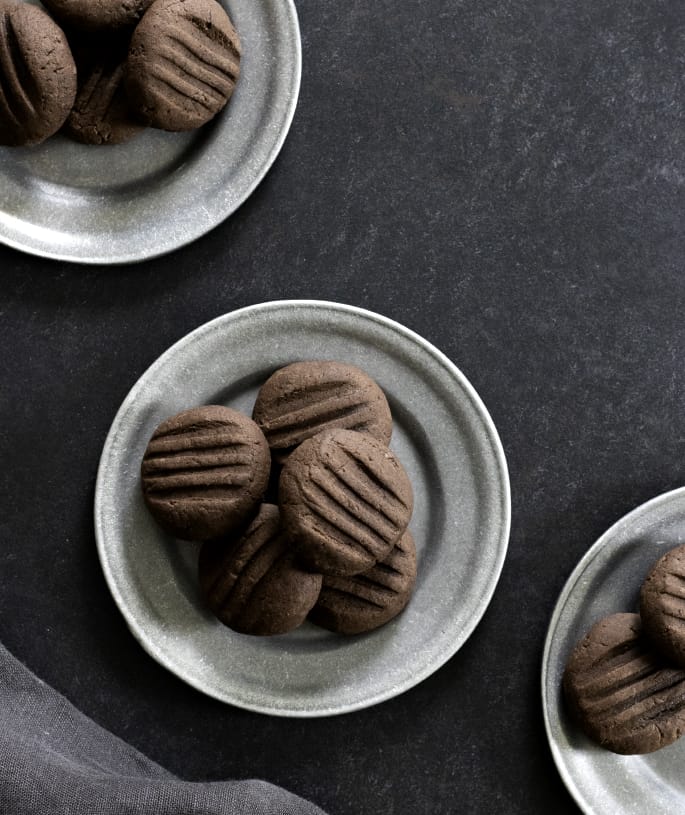 Plated and served chocolate gluten free meltaway cookies.