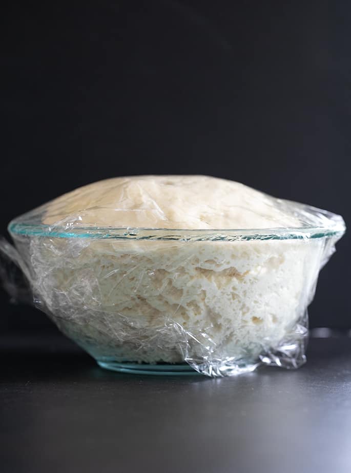 Gluten free artisan bread raw dough risen perfectly and ready to be put in the oven.