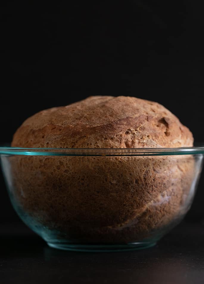 Gluten free artisan bread baked in bowl, fresh out of the oven. 