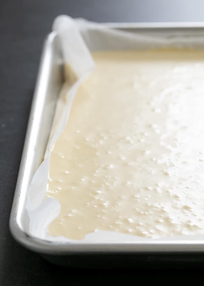 Raw batter for gluten free pancakes made in a sheet pan.