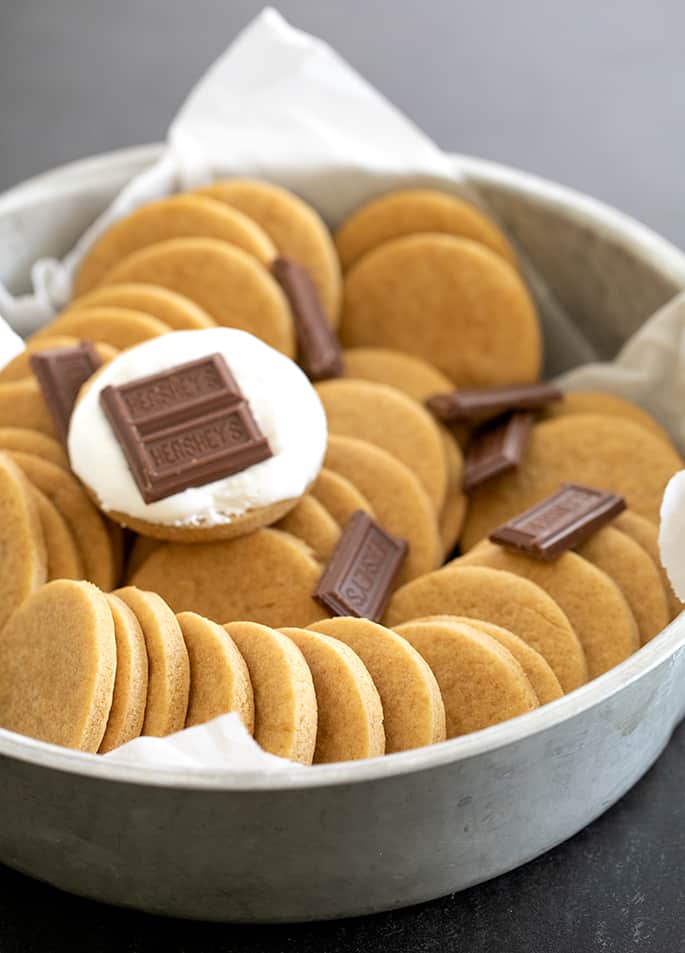 Soft graham cracker rounds with pieces of chocolate and marshmallow fluff